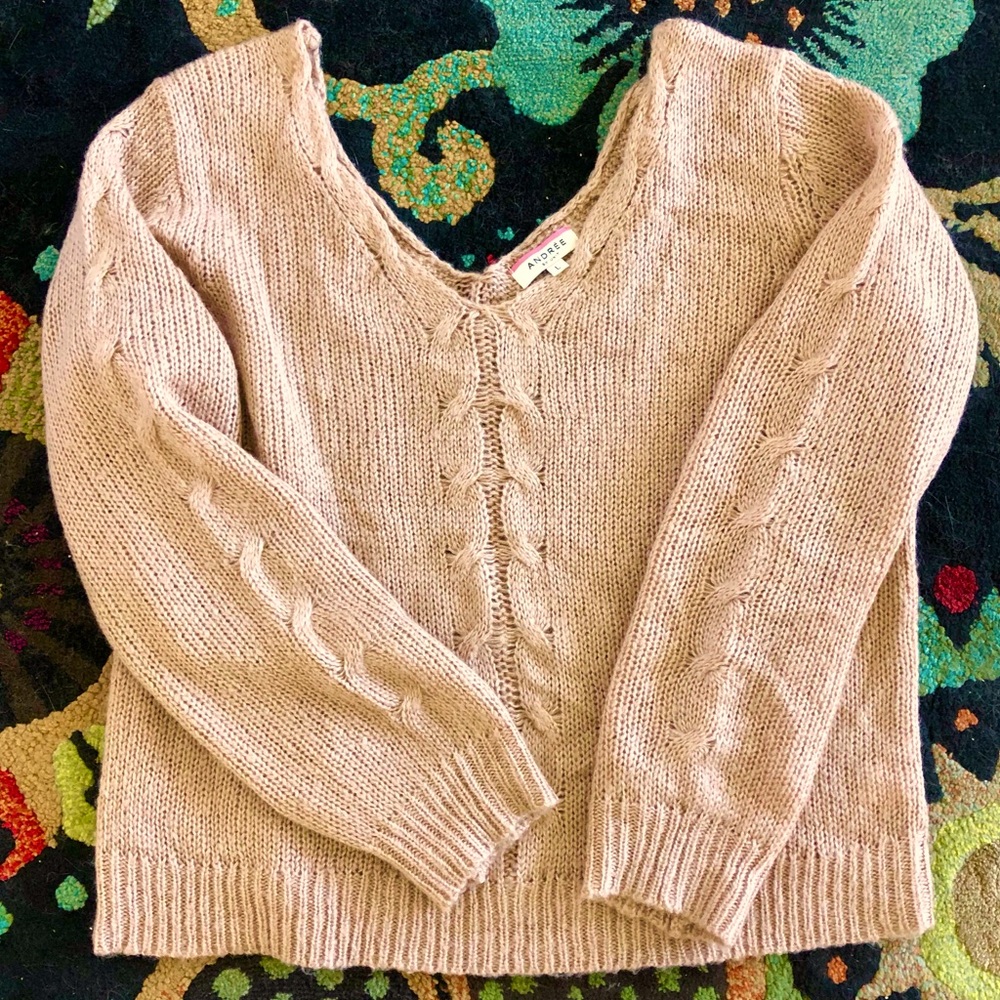 Soft sweater with cable knit details